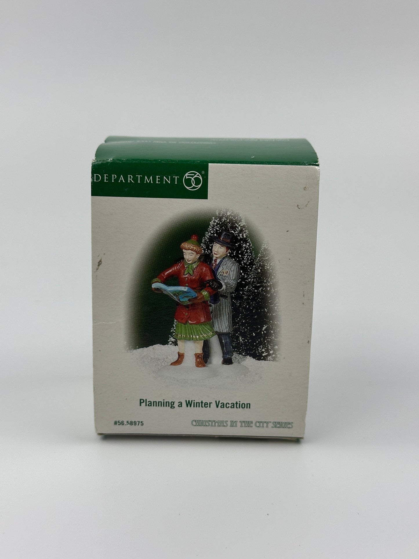 Department 56 - Planning a Winter Vacation - Christmas in the City