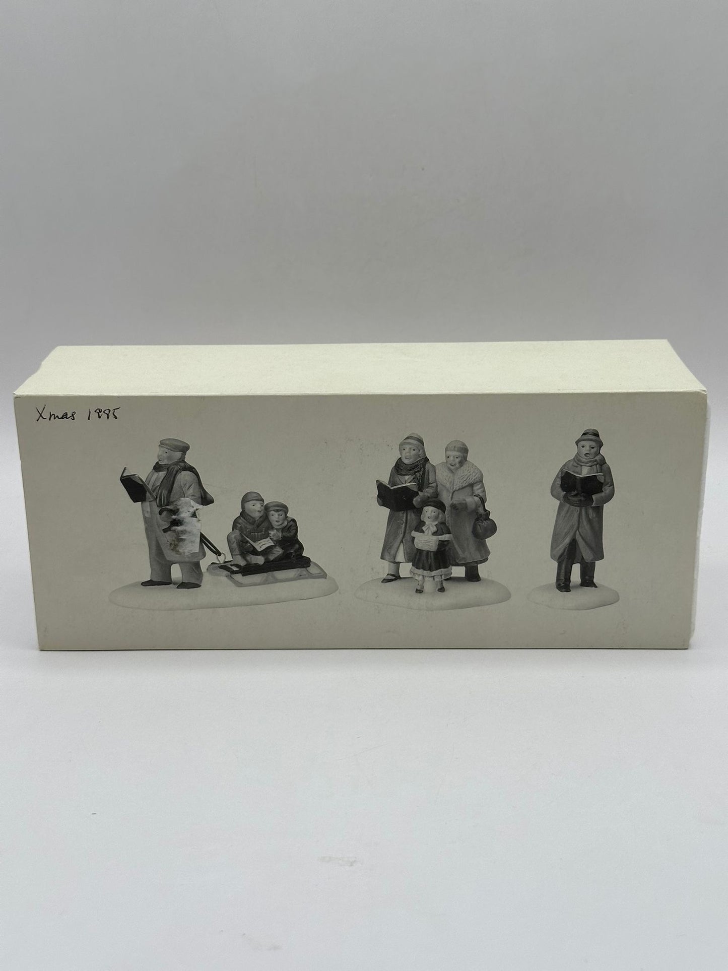 Department 56 - Caroling Thru The City - Christmas in the City