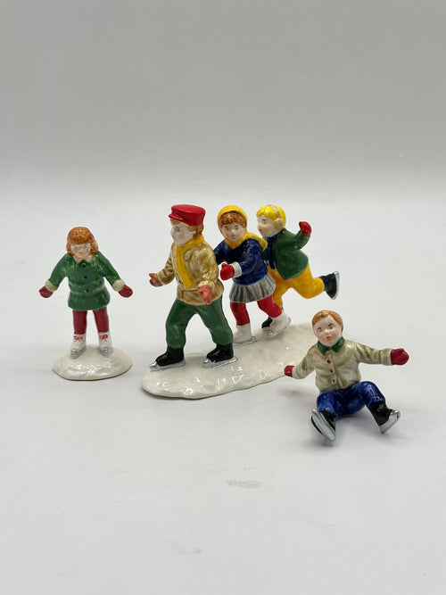 Department 56 - Crack the Whip Skaters - Original Snow Village