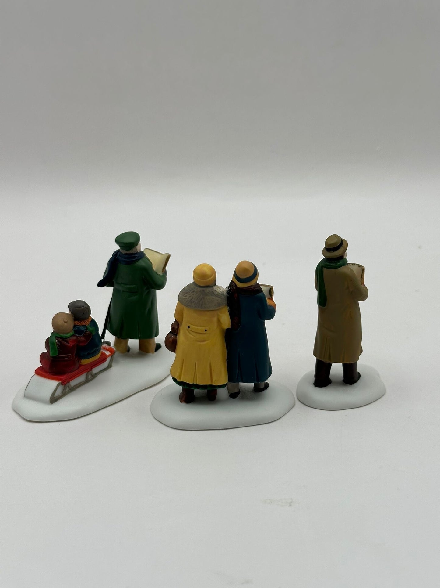 Department 56 - Caroling Thru The City - Christmas in the City