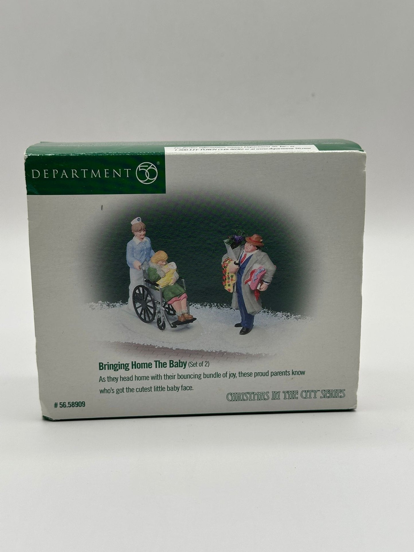 Department 56 - Bringing Home The Baby - Christmas in the City