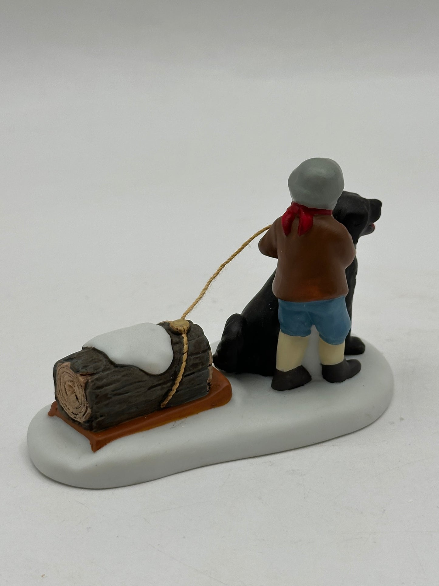 Department 56 - Getting The Christmas Yule Log - Dickens' Village