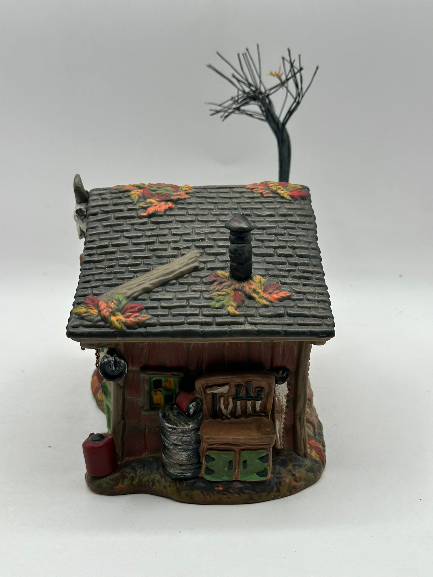 Department 56 - Lefty’s Chain Saw Repair and Studio - Snow Village Halloween