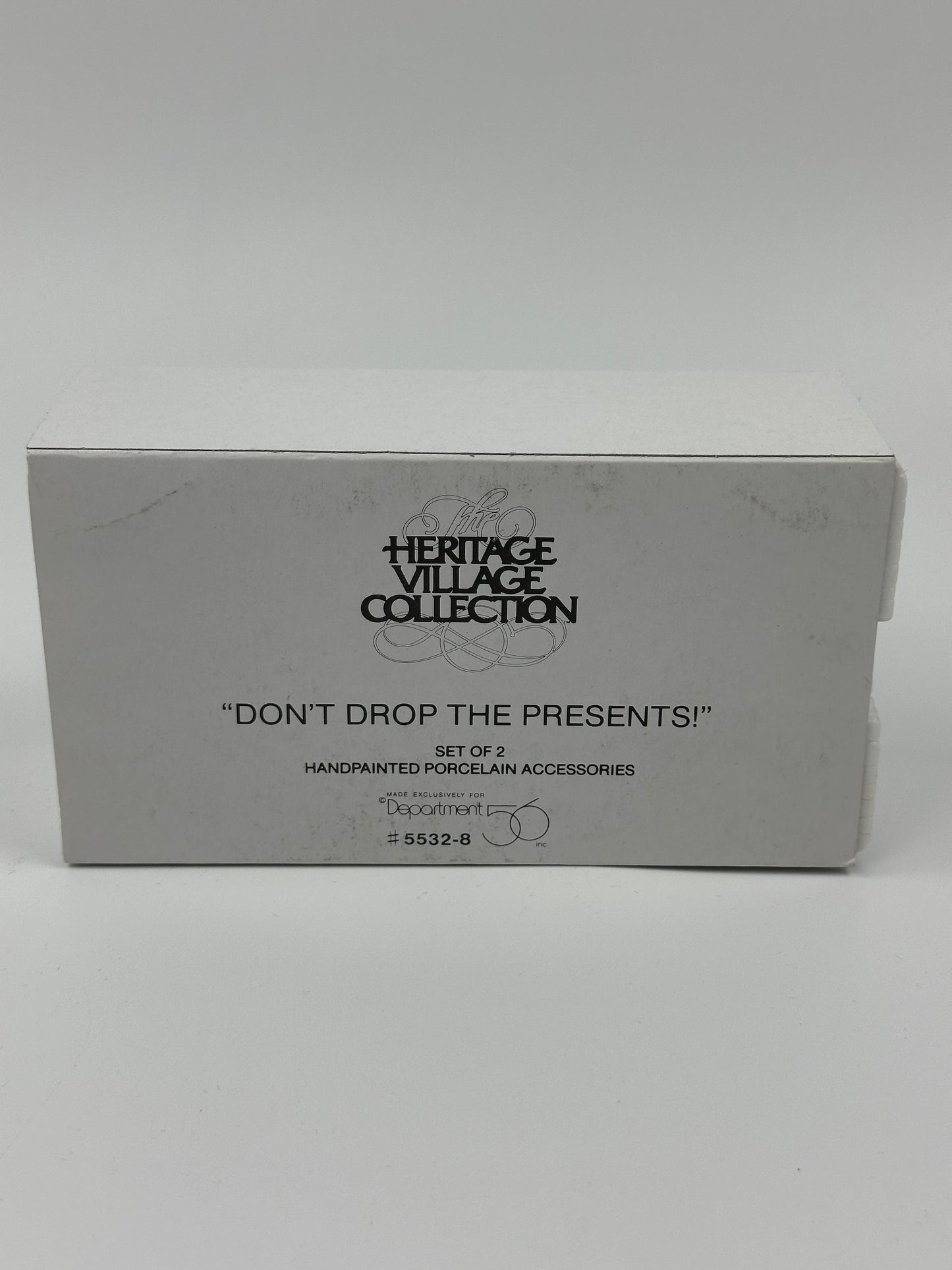 Department 56 - Don't Drop The Presents! - Christmas in the City